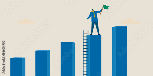 A businessman celebrates success by raising a flag atop a bar graph