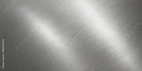 A smooth brushed metal texture features a polished stainless steel plate with a shiny silver aluminum surface and industrial grey reflections on a sleek metallic material pattern