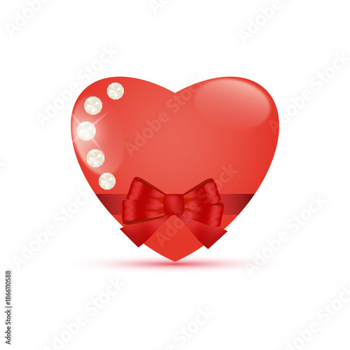 Red heart with bow and pebbles.