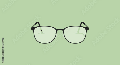 Black framed eyeglasses on a light green background