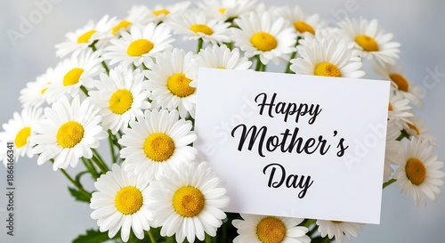 A beautiful bouquet of white daisies with a 'happy mother's day' card for celebration