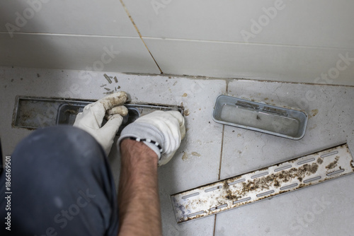Mold damage in bathroom. Sewer and bathroom drain