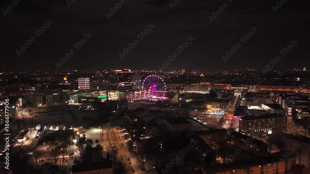 custom made wallpaper toronto digitalAerial drone video of Werksviertel-Mitte in Munich, Germany, at night. Illuminated Umadum Ferris wheel near Muenchner Ostbahnhof, festive city lights and modern skyline during New Years Eve