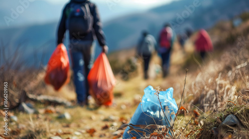 Group of volunteers carrying trash bags while cleaning up a scenic hiking trail surrounded by nature, promoting environmental awareness and community effort