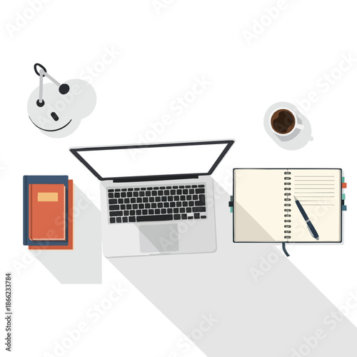 A workspace with a laptop, notebook, coffee, lamp, and books on a white surface