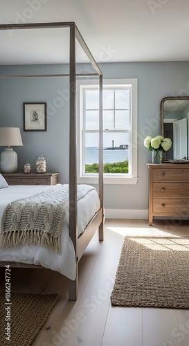 Serene Bedroom Interior with Natural Light and Coastal View.