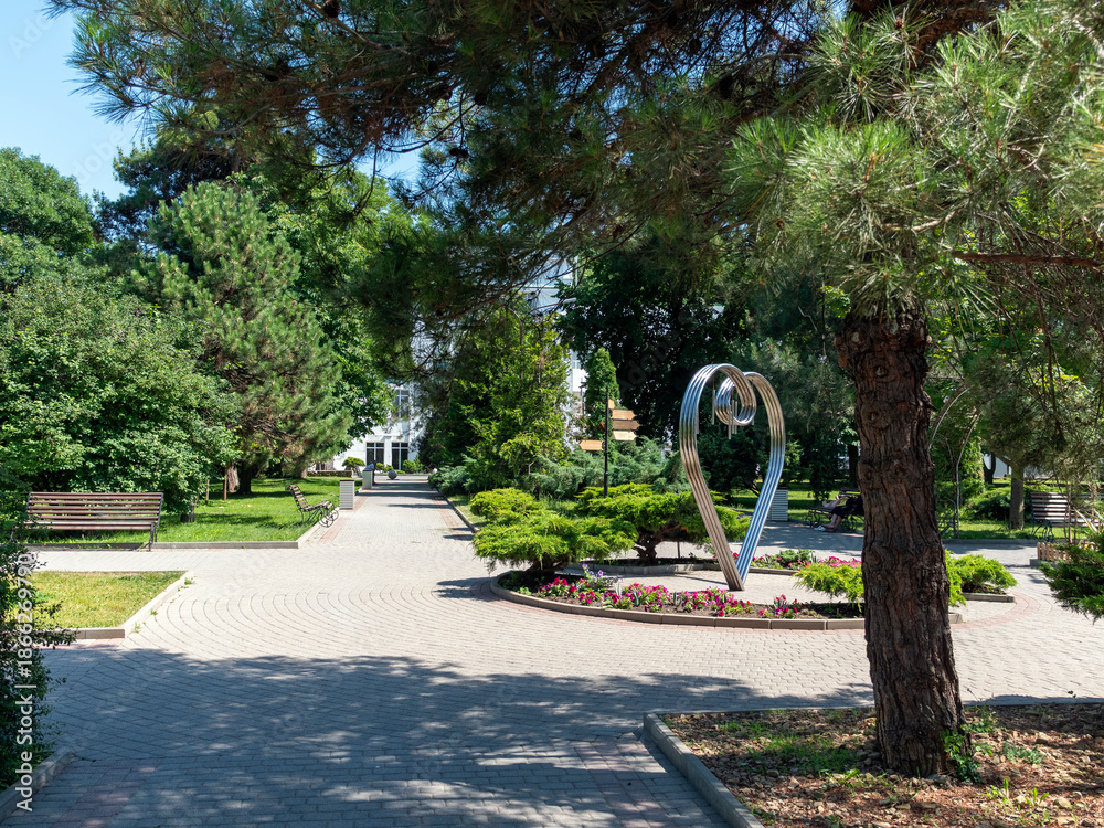 Fototapeta premium August 19, 2025 The promenade along Lake Abrau-Dyurso with calm water, greenery, and scenic surroundings