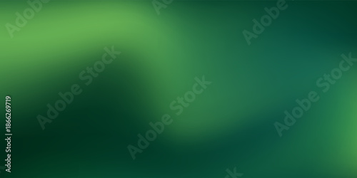 Abstract blurred gradient mesh background in green.