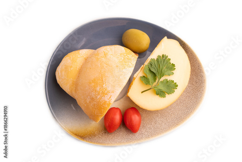 Smoked Mozzarella cheese, with tomatoes and olives isolated on white, top view, copy space.