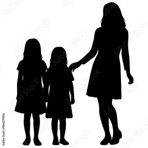 Silhouette of a mother holding hands with her two daughters.