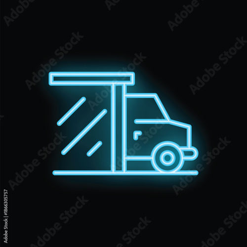Blue neon sign of a truck passing through a toll booth on a black background