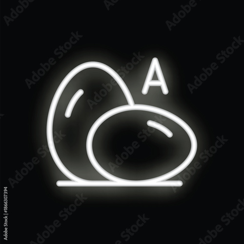 Neon sign of two eggs with vitamin a glowing on a black background