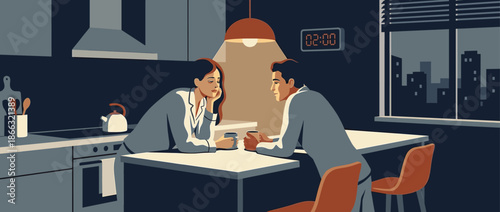 Young couple in pajamas having a serious late-night conversation over coffee, sitting at a table under a warm lamp in their dark apartment kitchen with a city view