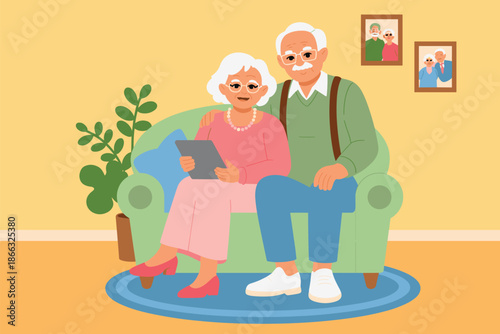 Happy senior couple using tablet computer relaxing on sofa in living room elderly man and woman enjoying modern technology at home family togetherness lifestyle communication for healthcare retirement