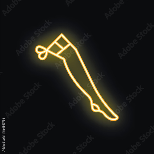 Neon yellow glowing outline of a woman's leg wearing a stocking with garter belt and heart detail on black background