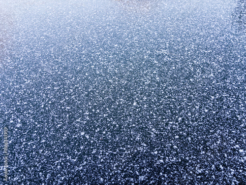 Fresh snowfall on a frozen canal
