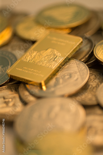 Quadro su tela Gold Bullion Bar and Coins - Wealth and Investment Symbol