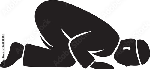 Silhouette of a Person Performing Sujud Prostration During Islamic Prayer