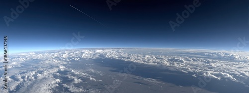 Clear view of clouds and sky from high altitude during a flight