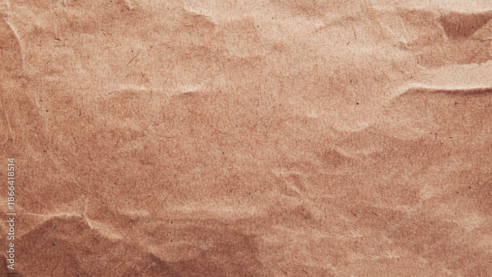 Fototapeta premium Crumpled brown paper texture background. Brown paper board texture