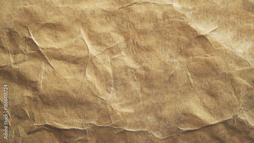 Brown crumpled craft paper background. Old texture eco waste recycling concept. 