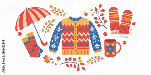 Autumn and winter clothing items arranged in a decorative colorful flat lay