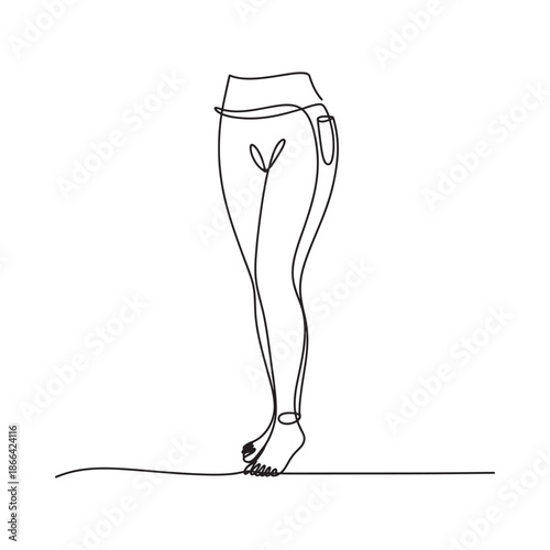 Woman standing on tiptoes in ballet shoes from behind