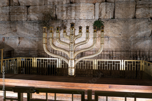 Photos The Western Wall Hanukkiah illuminated against the ancient stones of the Western Wall in the evening