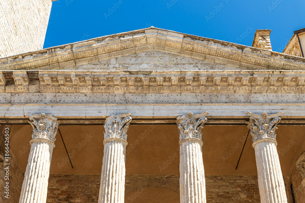 Naklejka premium Temple of Minerva pediment and Corinthian columns, Assisi