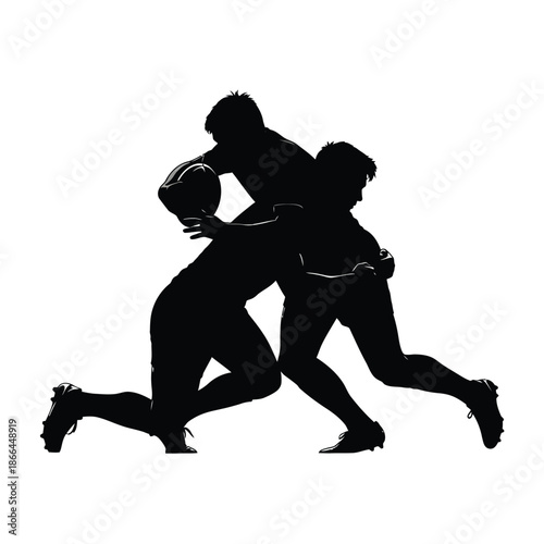 Принти на полотні Rugby players in silhouette tackling for the ball.