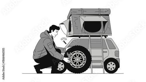 Man Changing Tire On His Car With Roof Top Tent For Outdoor Adventure