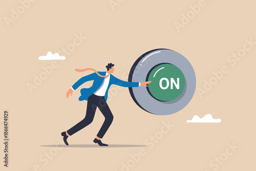 Businessman pushing a giant 'on' button, symbolizing new beginnings and activation