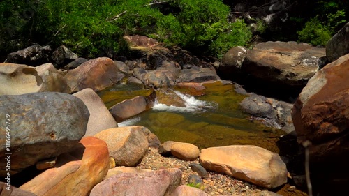 Mountain river.  Rocks and boulders of the mountain river of the BOHO waterfalls near Nha Trang in Vietnam. Video with sound.