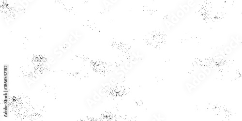 Abstract grunge background with black ink splats and liquid paint drops creating a dirty water splash pattern on a dusty glass frame wallpaper design