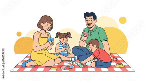 Cheerful Family Playing Card Game Together on Picnic Blanket in Park