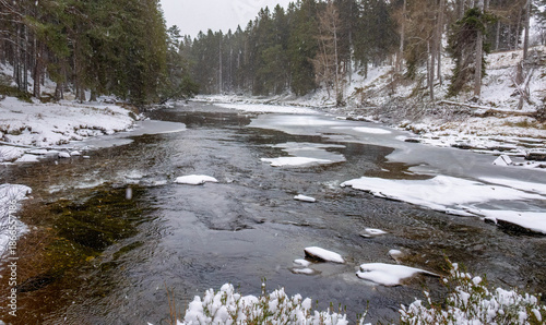 Cascading water in the River Dee in snow and ice