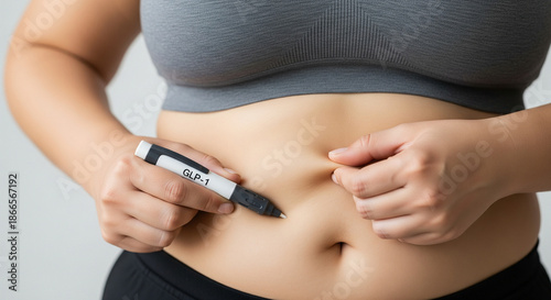 Overweight woman injecting GLP-1 medicine into her belly, concept of modern weight loss treatment, diabetes therapy, and obesity management.