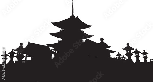 Traditional japanese pagoda temple building in a striking black silhouette