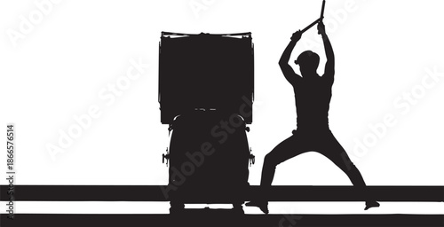 A drummer performing with a drum kit on a stage silhouette