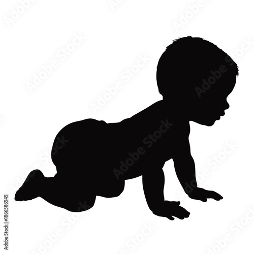Baby crawling on hands and knees in black silhouette