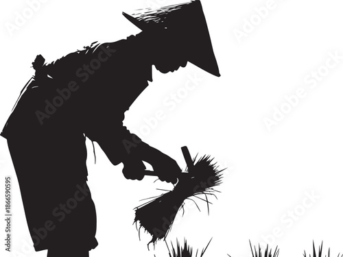 Farmer tending rice with traditional conical hat a striking silhouette