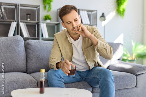 Bild auf Leinwand Man with alcohol addiction smoking in stress
