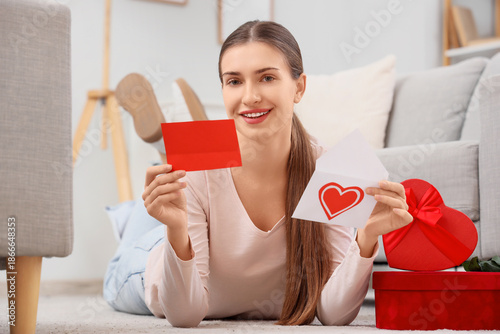 Young woman reading love le...