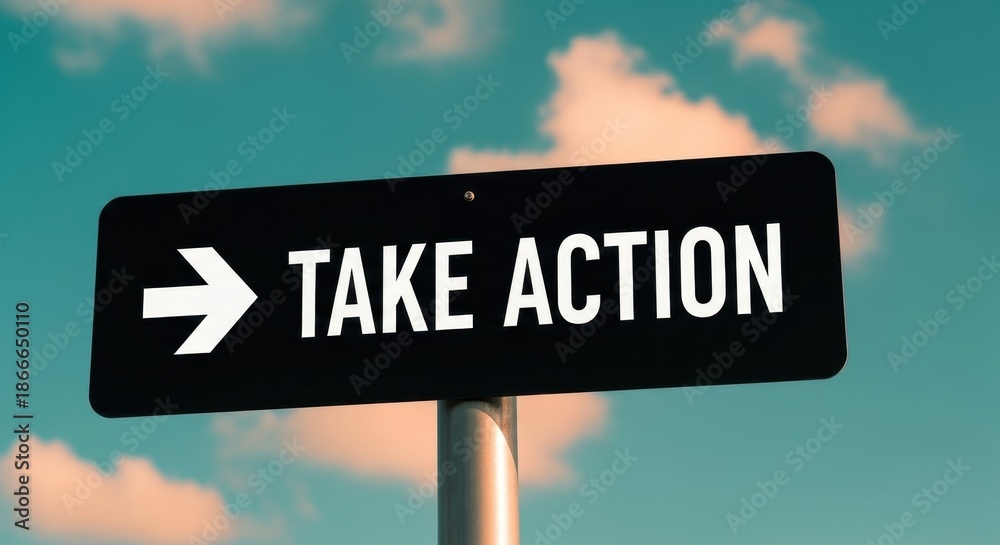 Obraz premium A Black Signboard Pointing With The Words TAKE ACTION In A Bright Blue Sky With Clouds