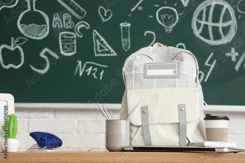 Backpack with coffee cup an...