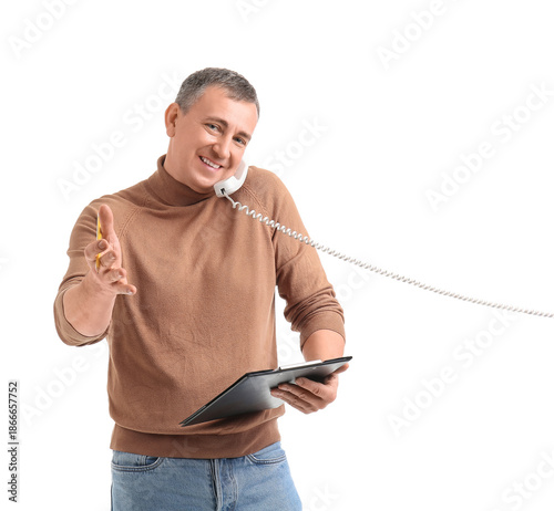 Mature man with clipboard t...