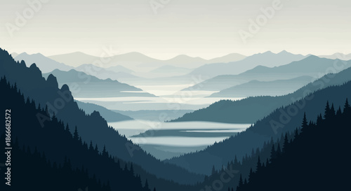 Serene mountain landscape with misty valleys and layered silhouettes at sunrise.