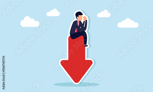 Sad businessman sitting on a red downward arrow illustrating sorrow and emotional struggle when facing business losses