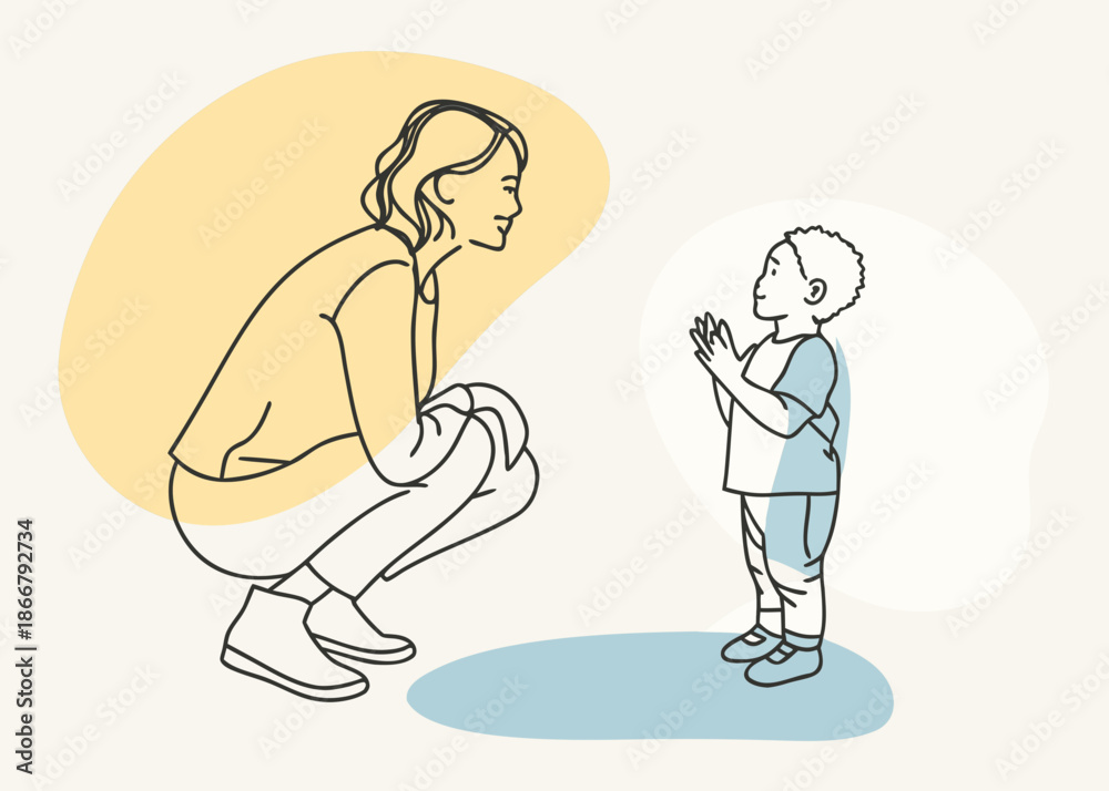 Fototapeta premium A mother crouching and listening to her young son with hands clasped