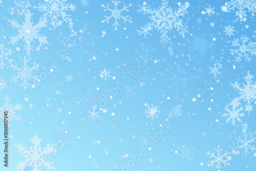 A serene blue background with delicate white snowflakes falling gently